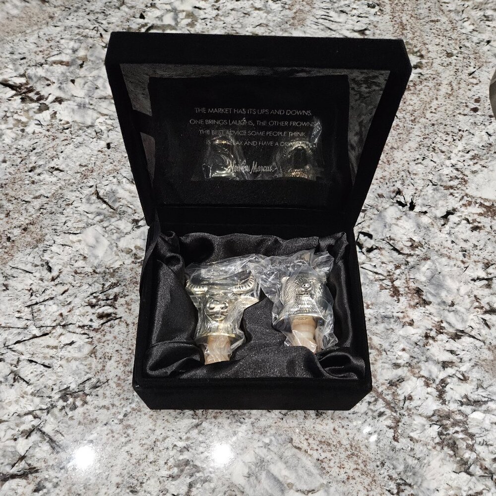 BRAND NEW AND UNIQUE PAIR OF NEIMAN MARCUS BULL AND BEAR BOTTLE STOPPERS